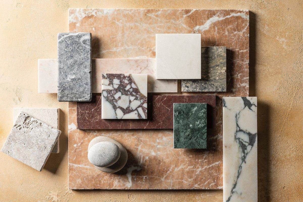 A mix of coloured and neutral stone tiles.