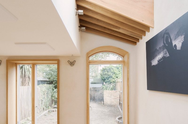 A quiet home project with acoustic panels and wood flooring.