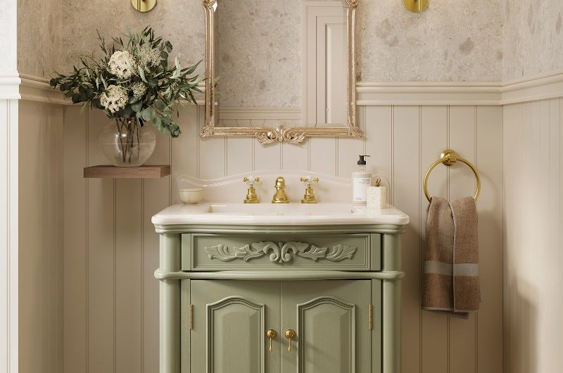 A bathroom design with Regencycore details, such as classic vanity, gold mirror and wall panelling.
