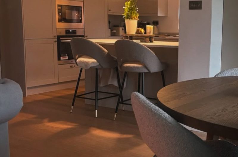 Looking into a warm and cosy kitchen renovation from the dining zone.