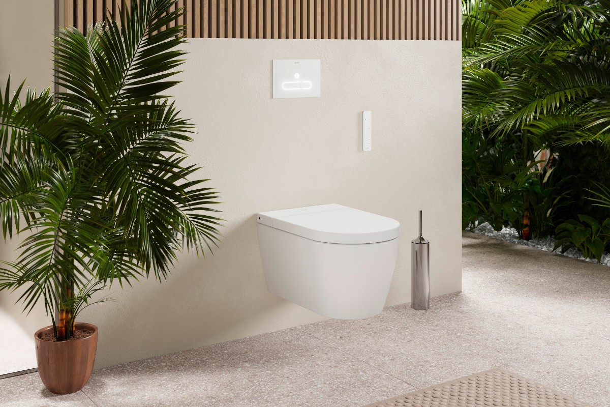 A calm scheme with a wall=mounted shower toilet.