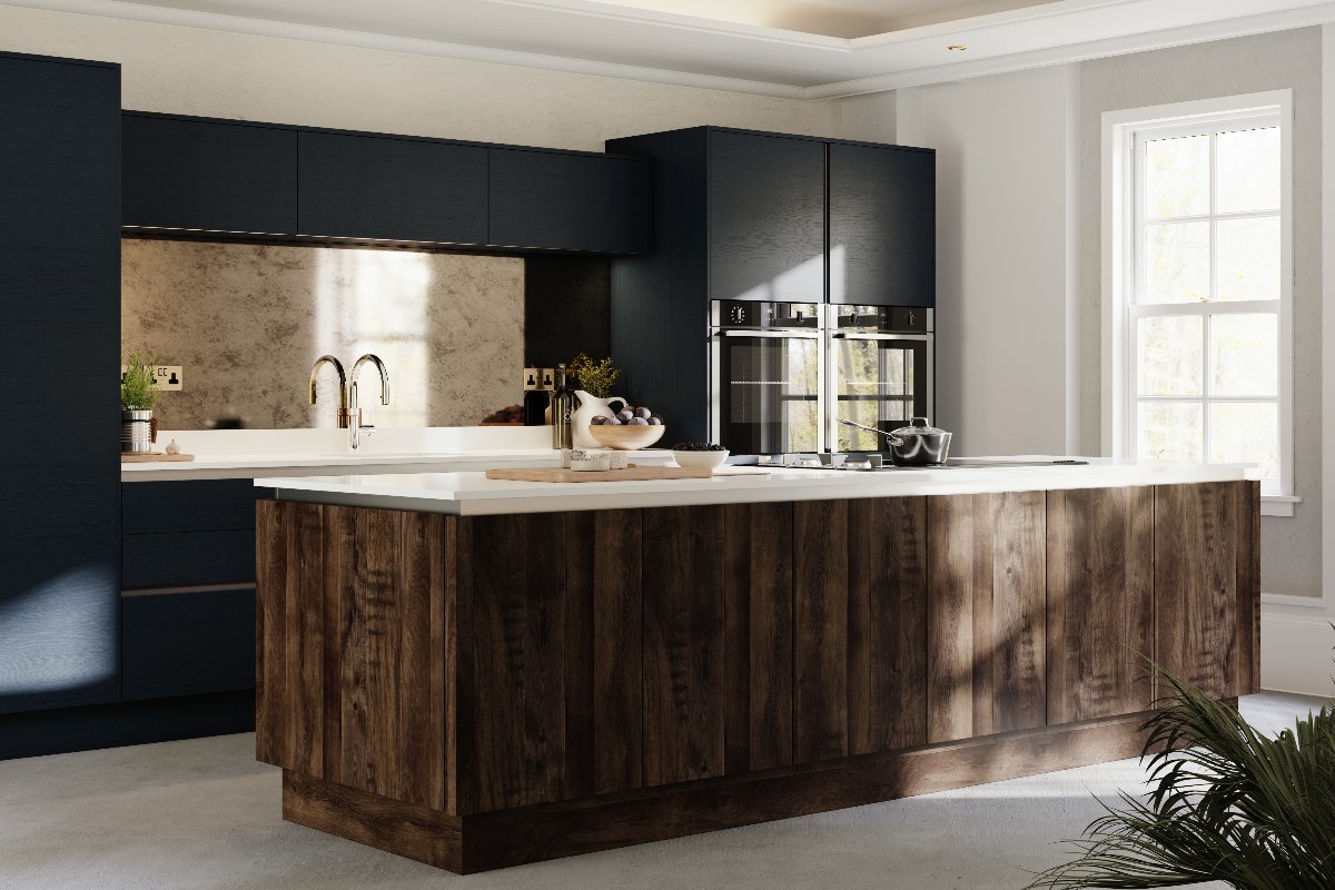 A run of dark cabinetry with mirrored splashback and a dark wood island with white work surfaces and flooded with light.