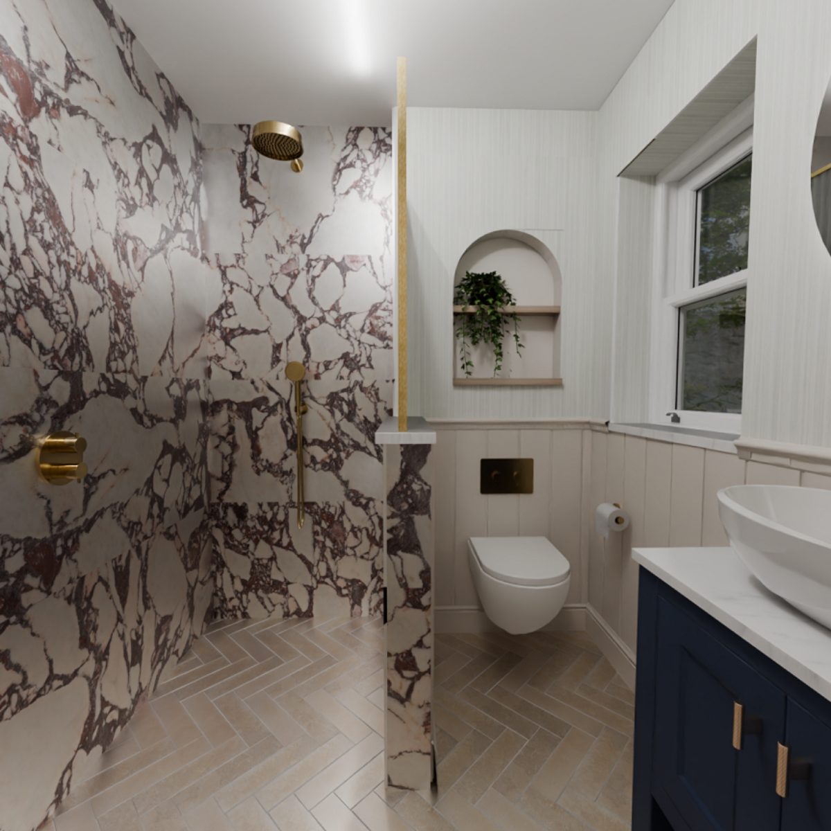 A walk-in shower with marble tiles, herringbone flooring, with a pony wall separating it from the toilet and storage niche.