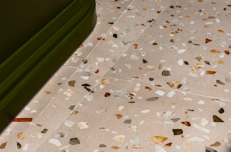 Closeup at a terrazzo wetroom floor.