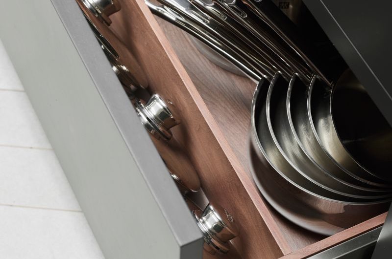 A pot and pan drawer with personalised space for coordinating lids.