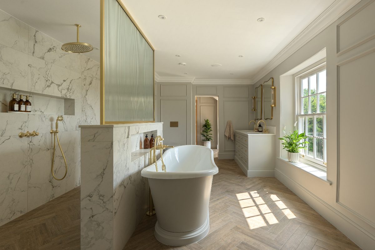 A luxurious bathroom design with a walk-in shower, a freestanding tub, and a double vanity unit.