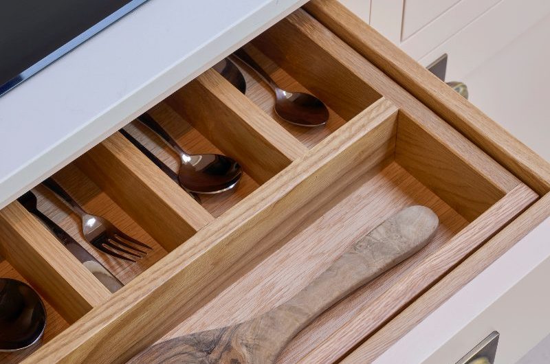Closeup inside a drawer with solid oak interiors.