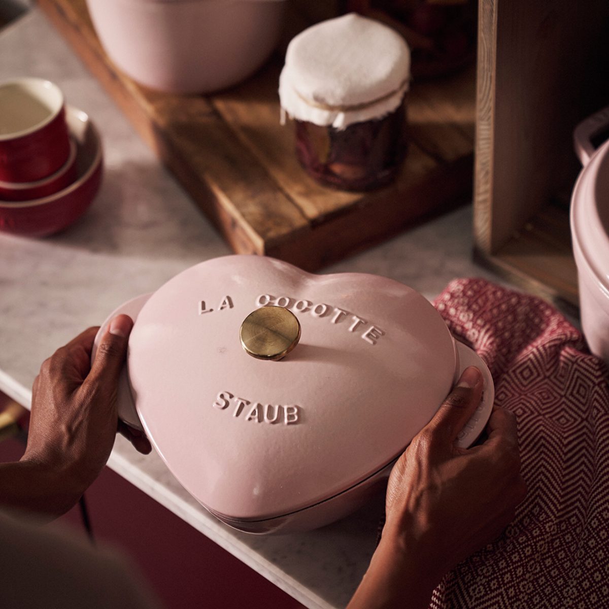 Closeup at a pink heart-shaped cocotte.