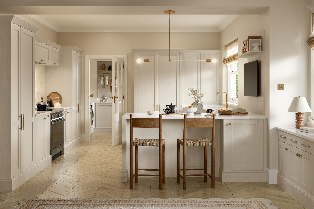 A light and bright scheme with a cooking zone and a peninsula with seating and a wash zone.