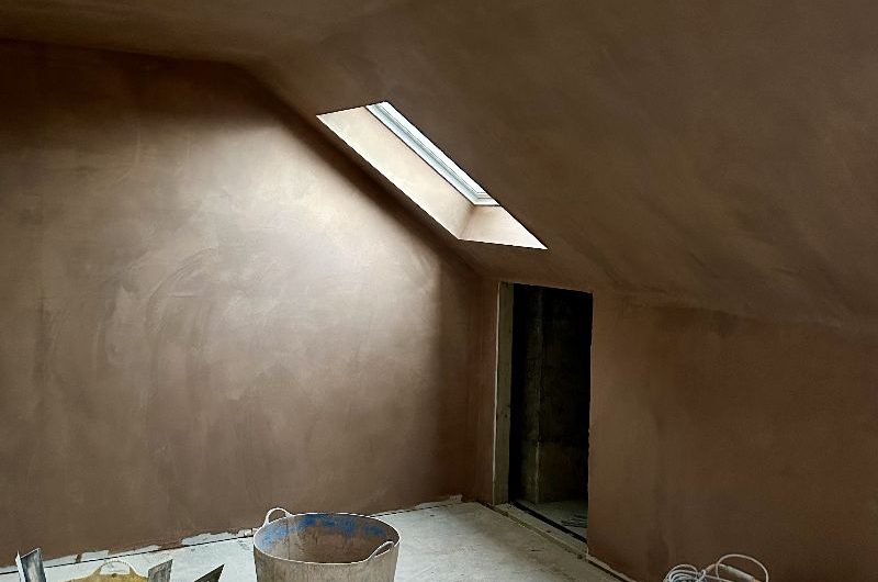 Plaster on the new loft walls and ceiling.