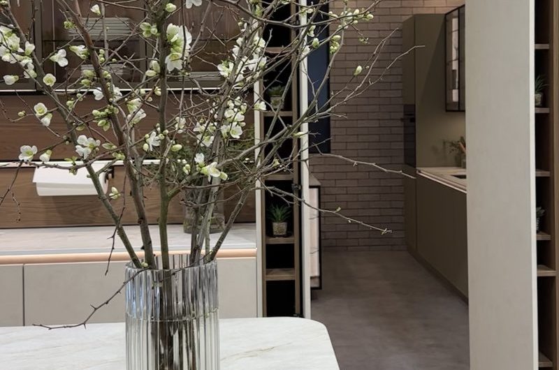 A hidden kitchen leading to a utility room.