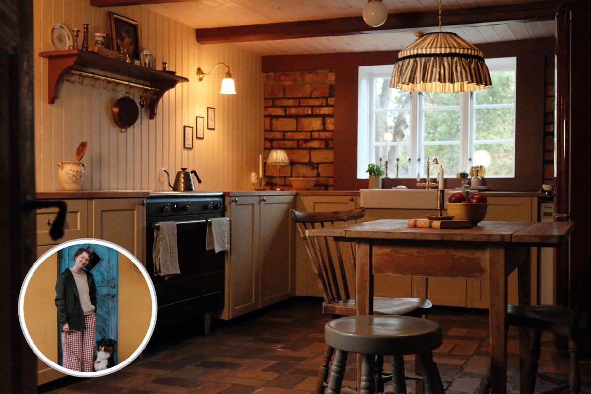A warm kitchen renovation with uneven beams, handmade local brick floors, and Shaker cabinetry.
