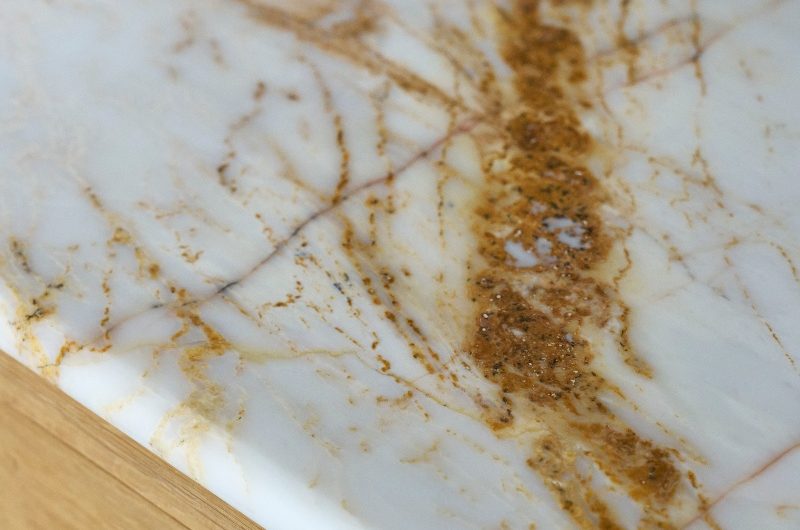 Closeup at a veiny marble worktop.