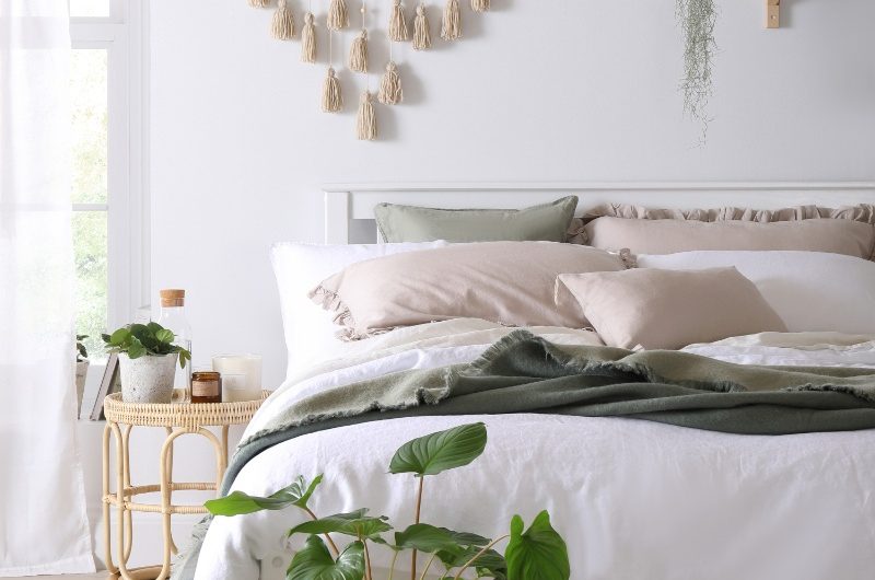 a calm neutral bedroom illustrating the concept of hygge
