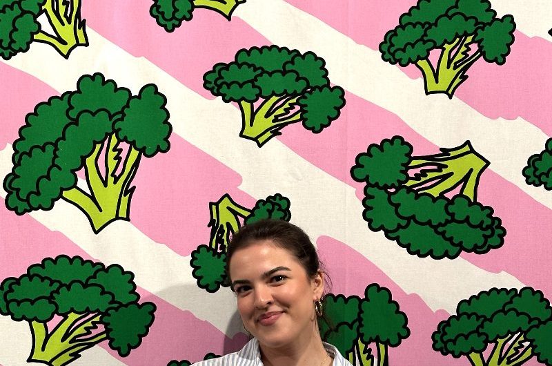 Anniken print with broccoli and pink and white stripes.