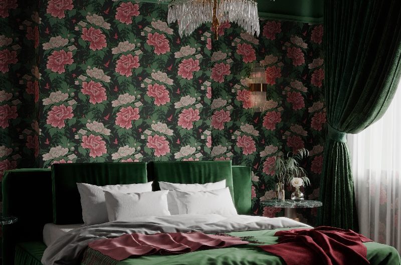 Dark scheme with green velvet fabrics, floral wallpaper, green curtains, and a burgundy rug under the bed.