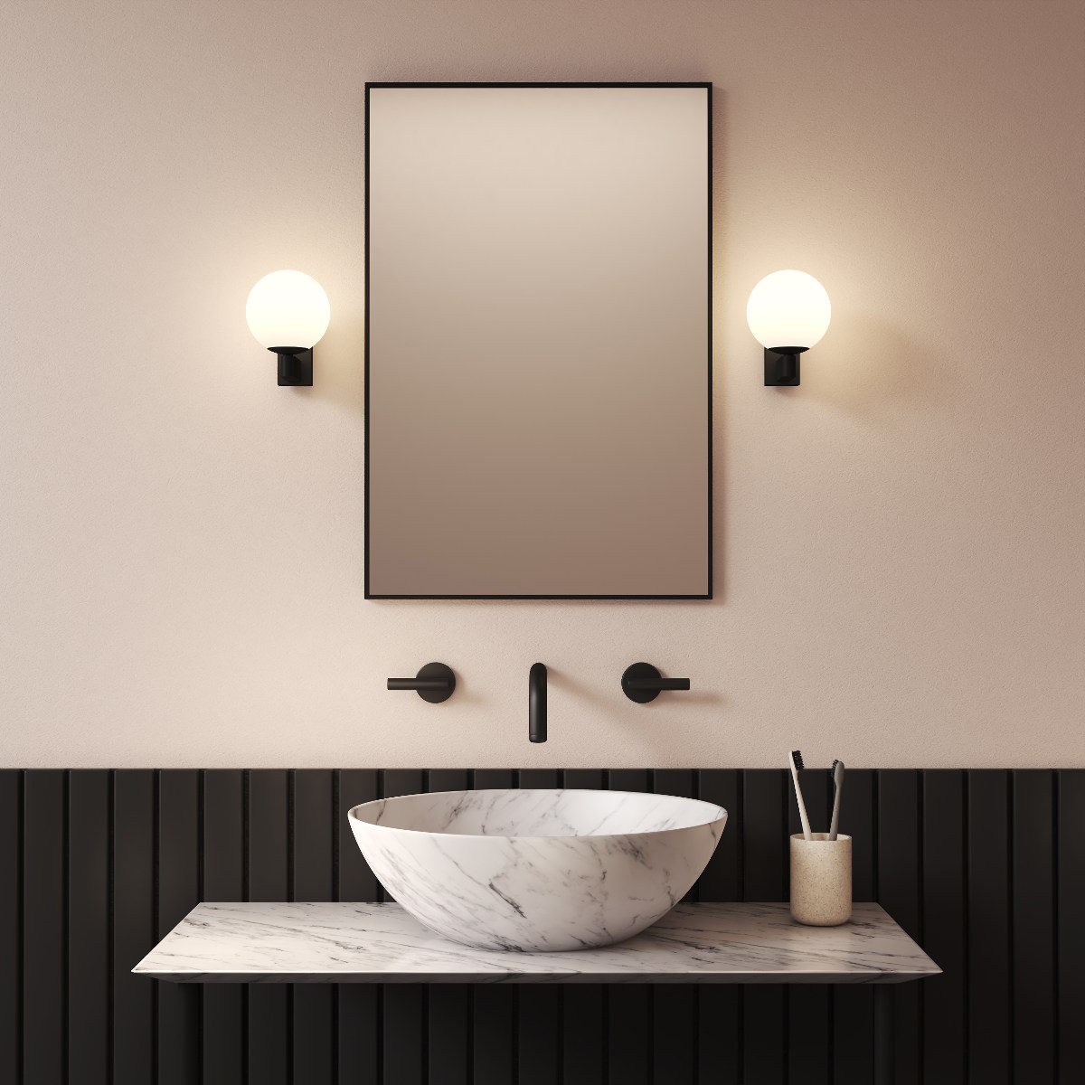 A modern and sleek scheme with black wall panelling, marble countertop and basin, and black brassware.