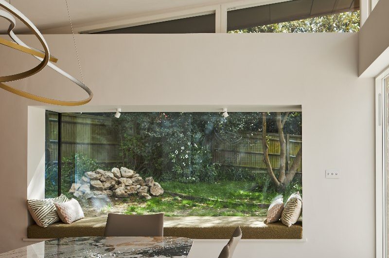 Elegant dining area with a window nook.