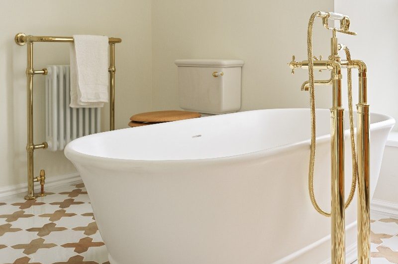 A bath taking centre stage in the spa-like bathroom design.