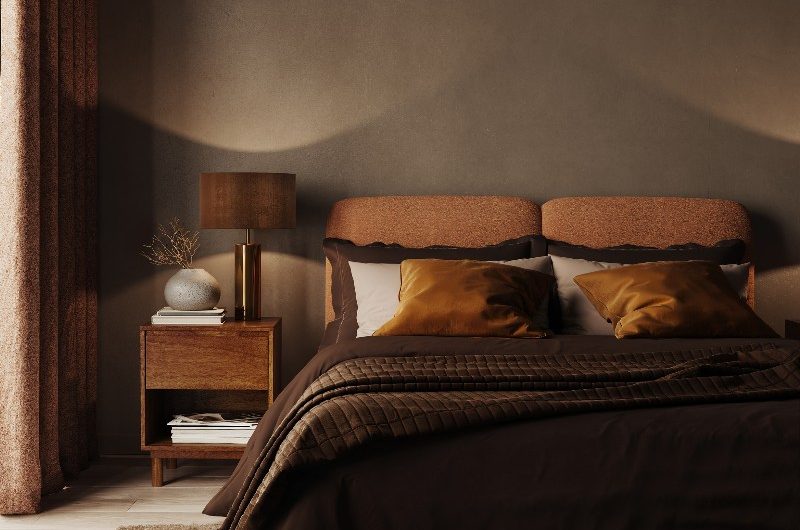 Cocoa-coloured bedroom with mood lighting and luxury bedding.