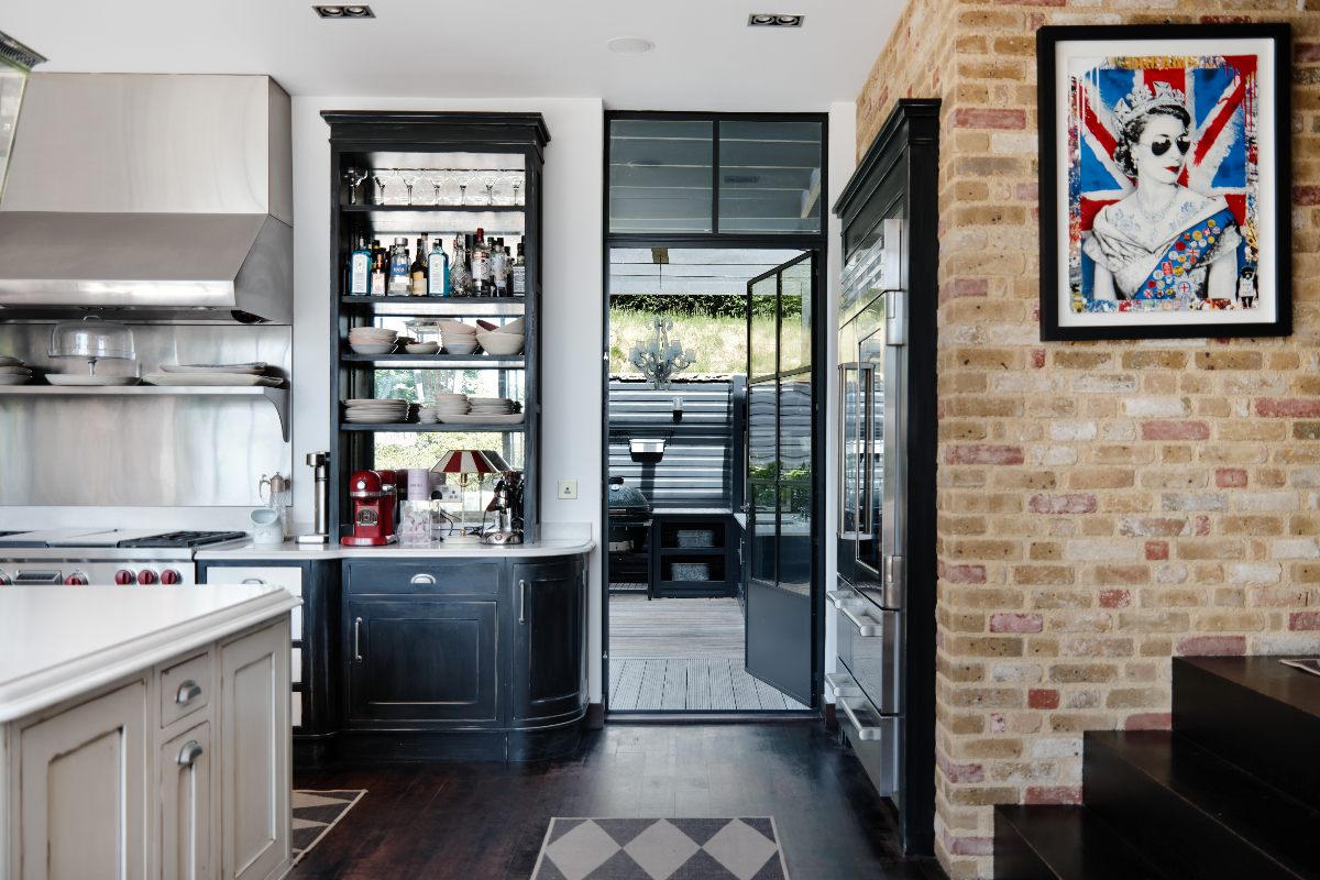 A look through Crittall doors into the outdoor kitchen.