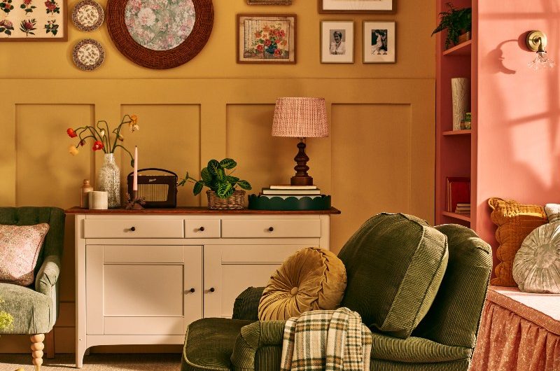 Living room drenched in autumn-inspired colours such as mustard yellow and mossy green.