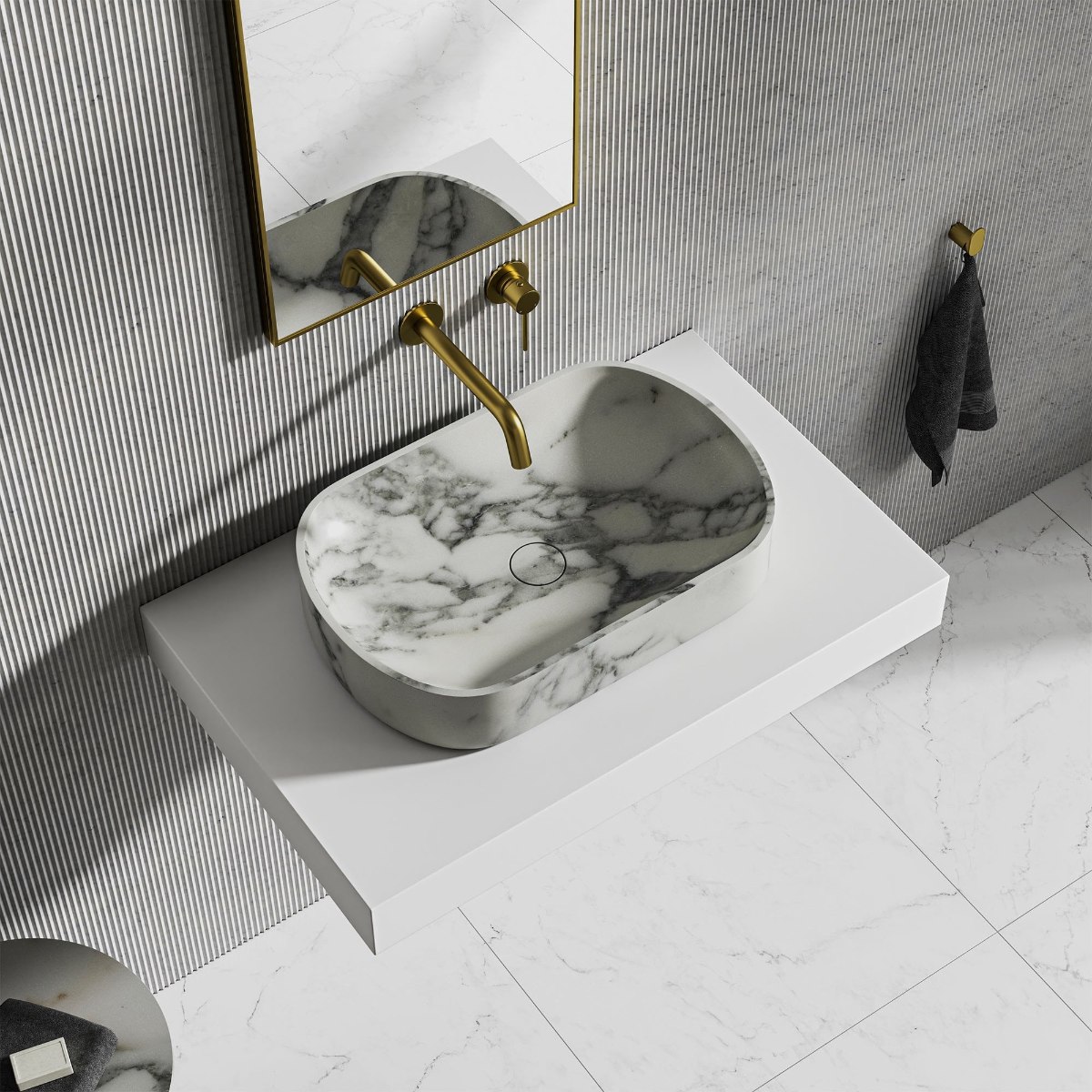 Luxury bathroom with marble surfaces and polished brass accents.