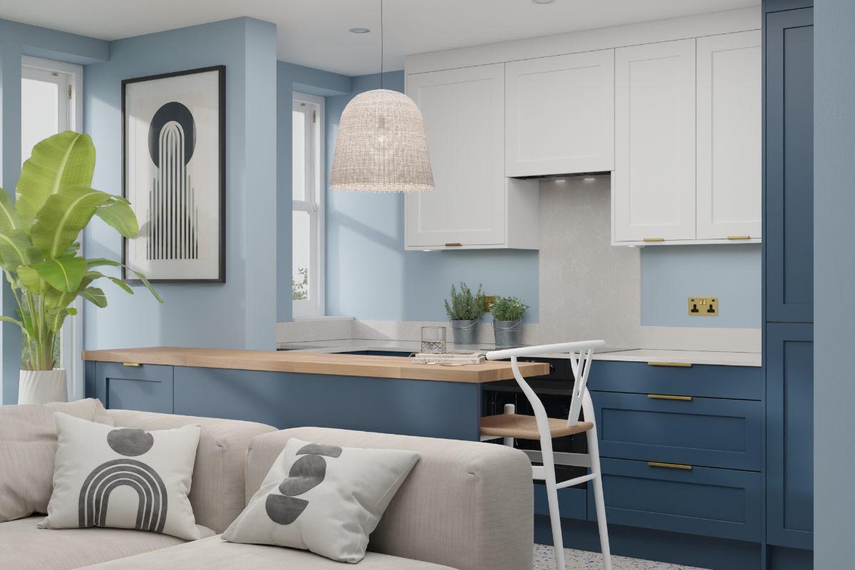 Kitchen design with blue base units, white wall units, and a wood-topped peninsula with a coastal feel.