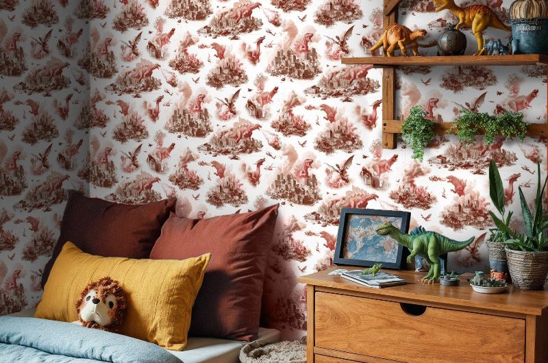 Jurassic-inspired kids' bedroom with patterned wallpaper, wood furniture, a single bed, and dinosaur decor.