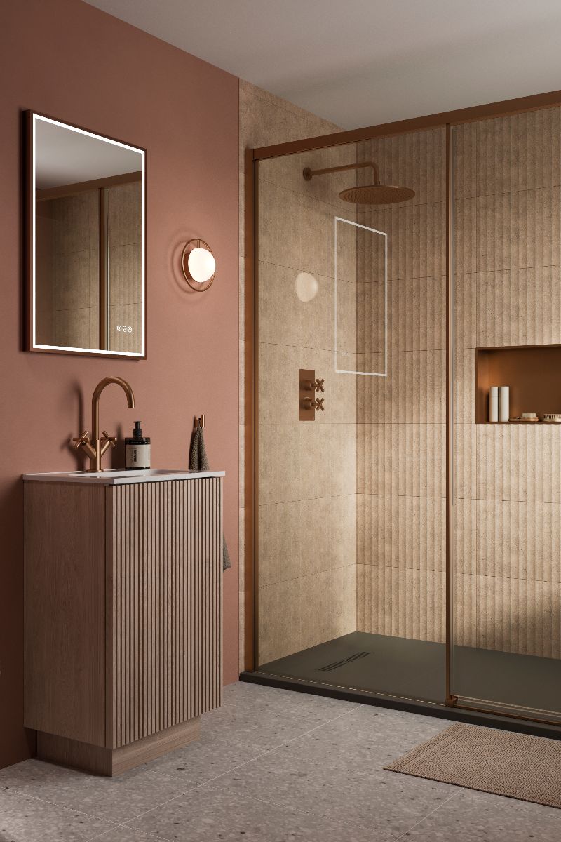 Modern bathroom with textured tiles, copper finishes, fluted wood furniture and terrazzo-style flooring.