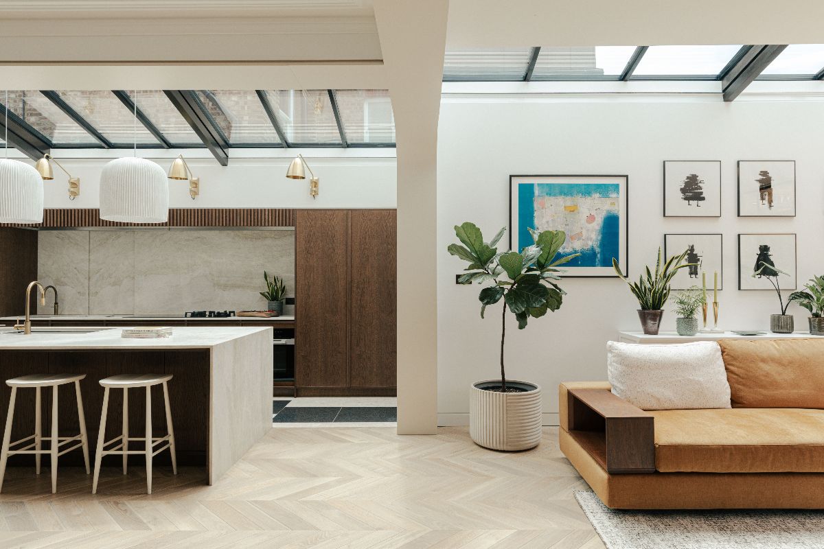 An open-plan kitchen-living-diner with natural materials and flooded with light.