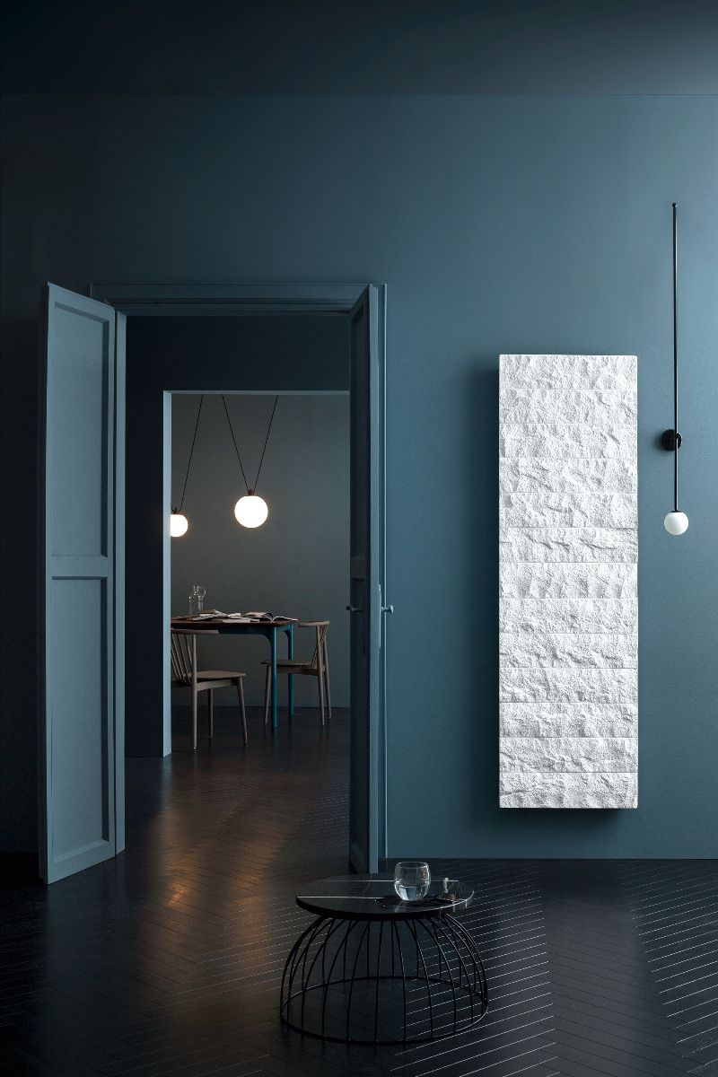 Recycled radiator in a colour-drenched room.