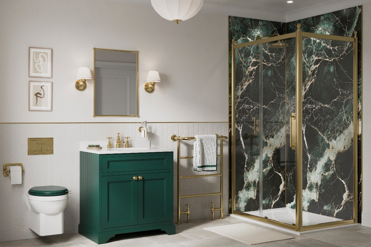 Contemporary bathroom with a shower clad in marble-effect panels, with a green vanity unit and a gold towel rail next to it.
