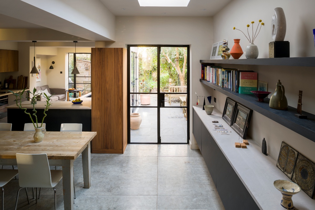 Open-plan kitchen-diner with glazing looking into the garden.