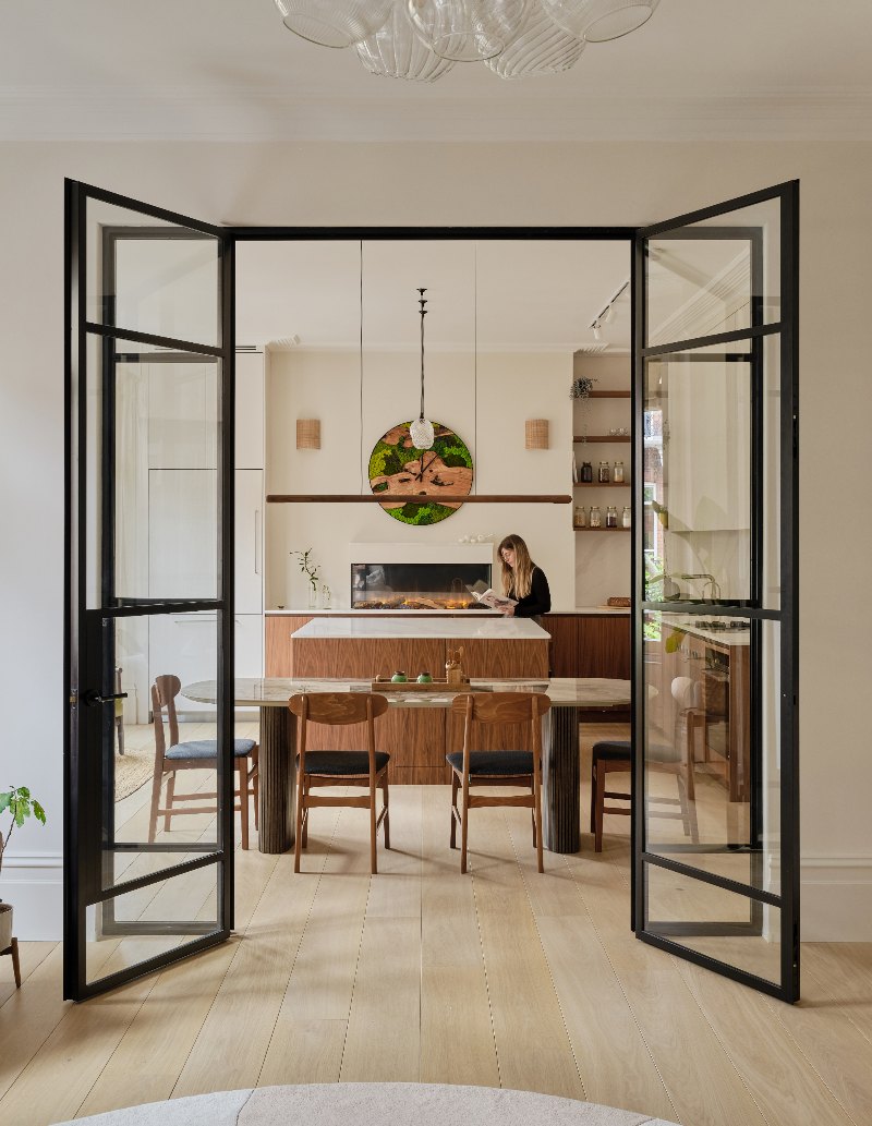 KBB magazine November issue cover star posing in a Scandi wood kitchen.