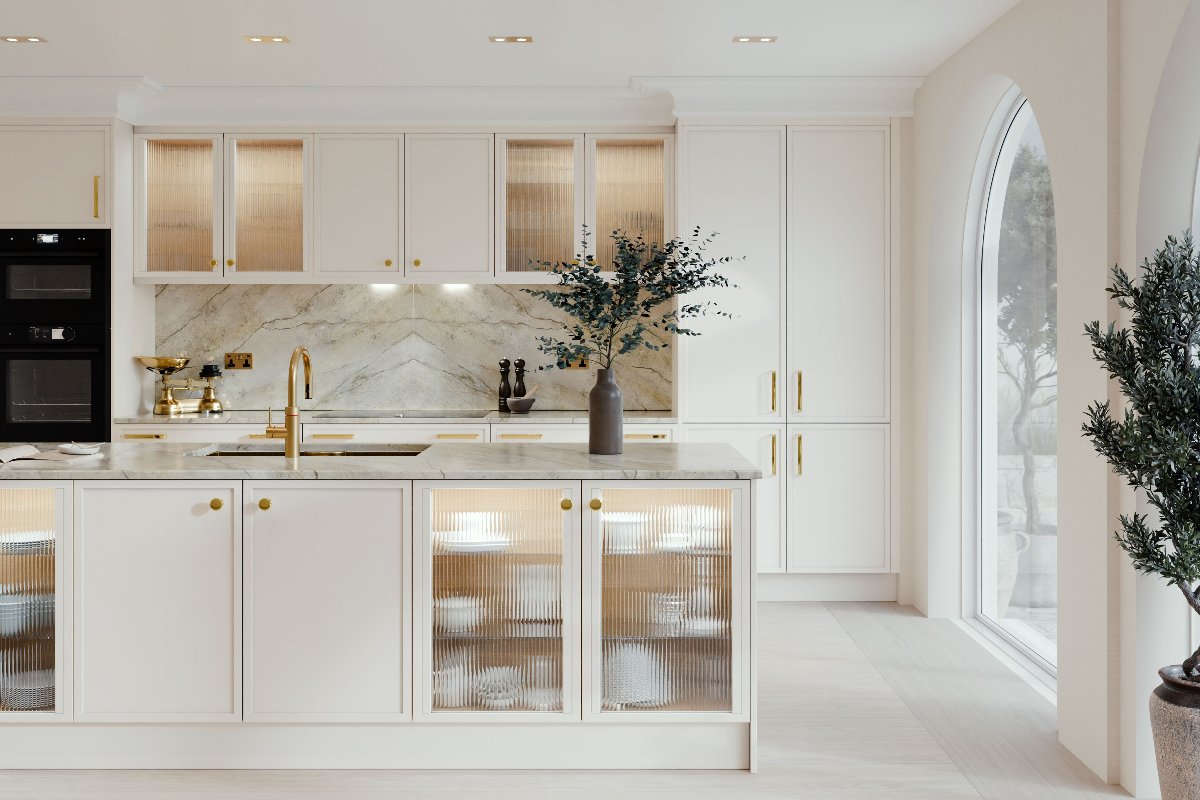 Slim Shaker white cabinetry with fluted glass, built-in lighting, marbled surfaces, brass detailing and curved windows.
