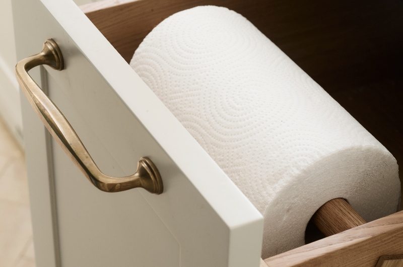 Closeup at a drawer housing paper towels.