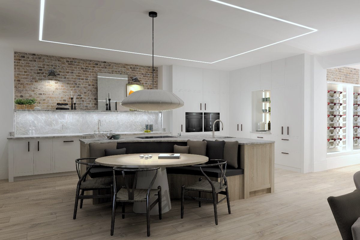 A multi-functional kitchen island with bench seating, a round dining table and chairs in a bright open-plan scheme.