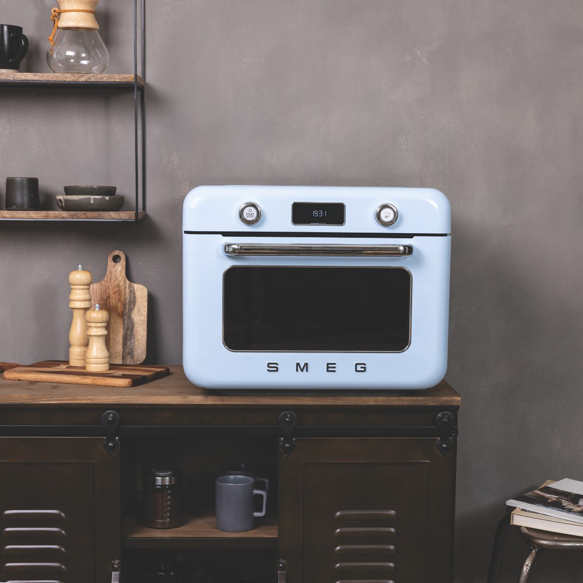 A retro, small countertop appliance in an industrial kitchen.