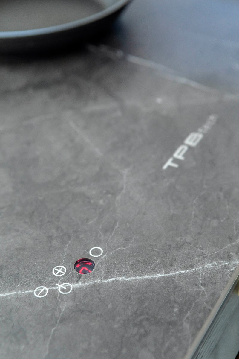 What is an invisible hob and what are its benefits?