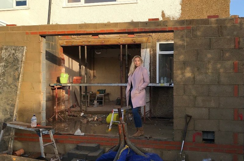 Georgina in the renovation site of her 1930s home.