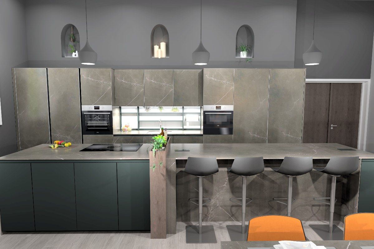 A single run of cabinetry with a central island with cooking and dining zones, and pendant lighting. 