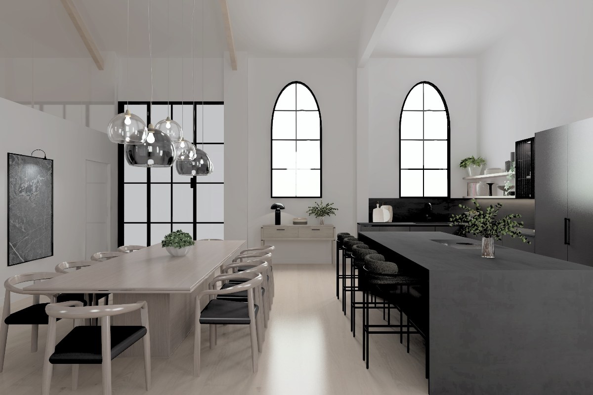 A light and bright L-shaped kitchen with dark cabinetry, a wood table with chairs, and wood flooring.