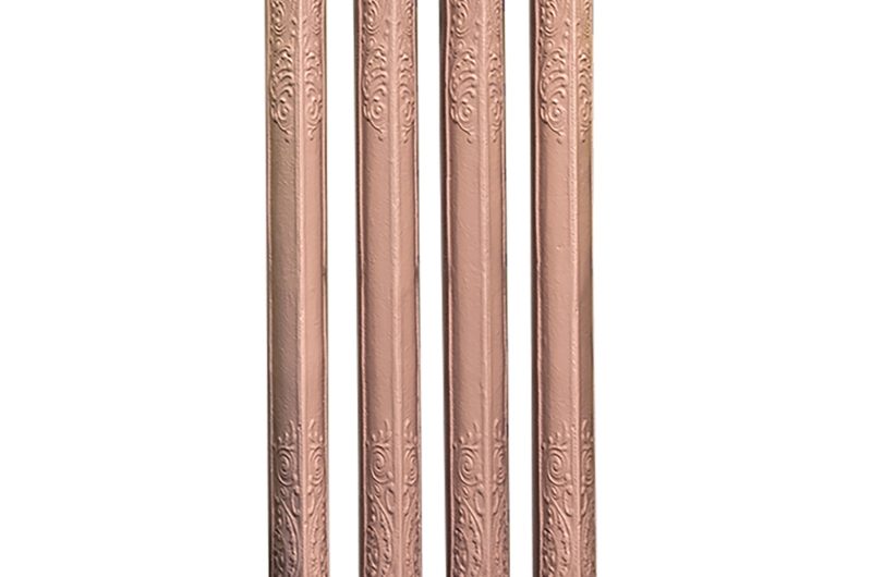 A Rococo radiator painted in pink.